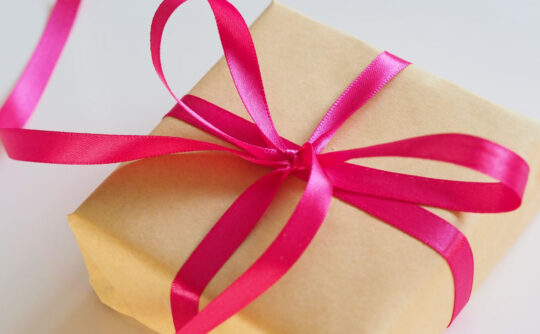 A gift wrapped with a bow