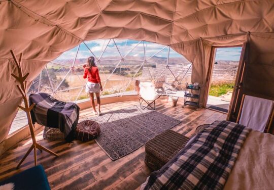 Woman standing in a yurt