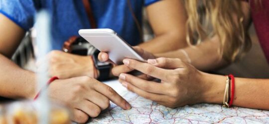 Person holding cell phone