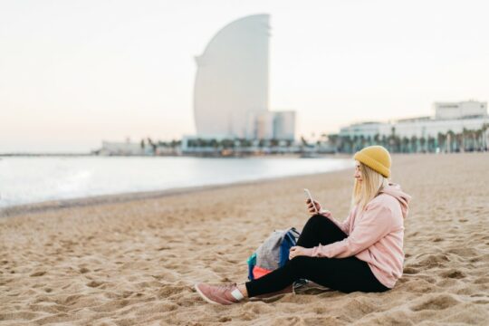 Woman sitting at the beach