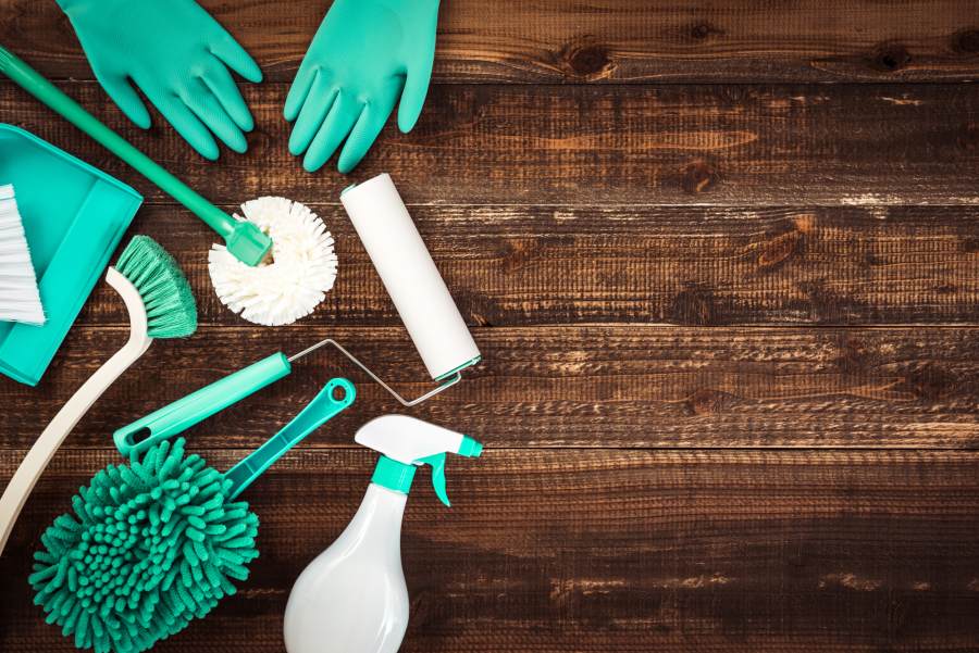 Cleaning supplies on a wooden table