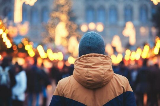 Person in a winter jacket facing away from the camera